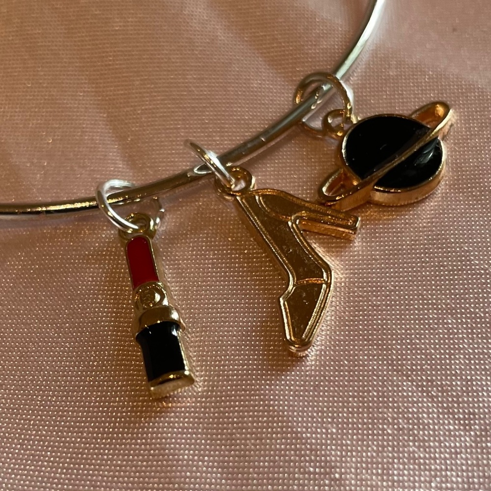 Charm Bracelet with lipstick charm, planet charm, and high heel charm NWOT